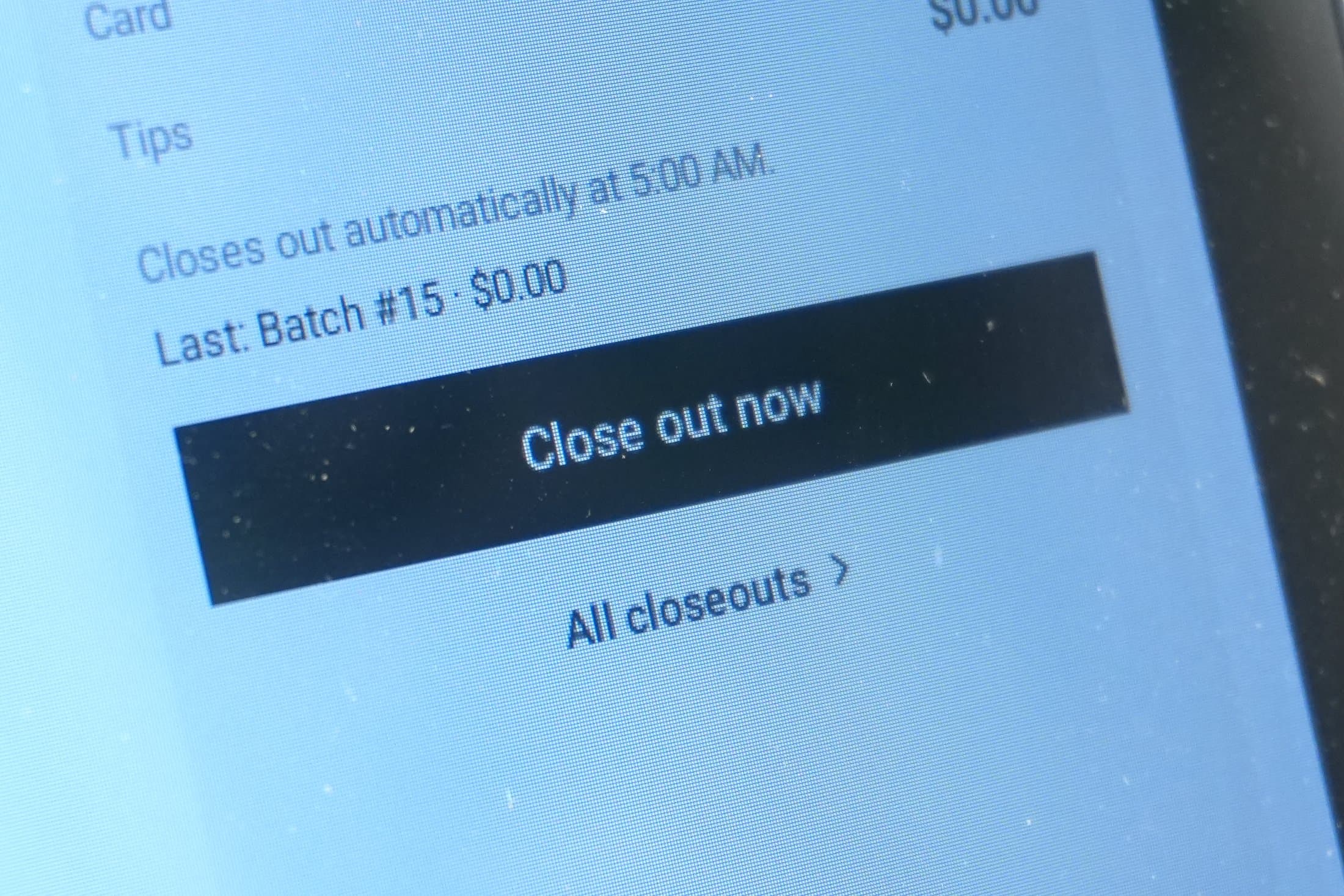 The register's closeout screen: closes out automatically at 5:00 AM, last batch shown